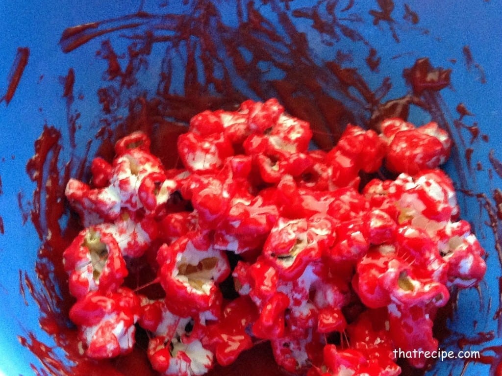 Red colored marshmallow and popcorn