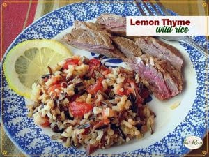 plate with wild rice and steak with text overlay "lemon thyme wild rice"