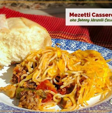 Beef and noodle casserole on a plate with text overlay "Mezetti Casserole aka Johnny Marzetti Casserole"