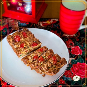 Sliced fruit cake on a plate with text overlay "caramel fruit cake"