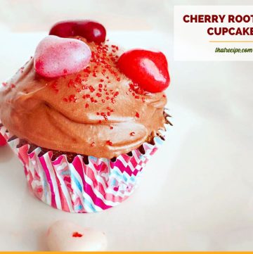 cupcake on a plate with text overlay cherry root beer cupcake