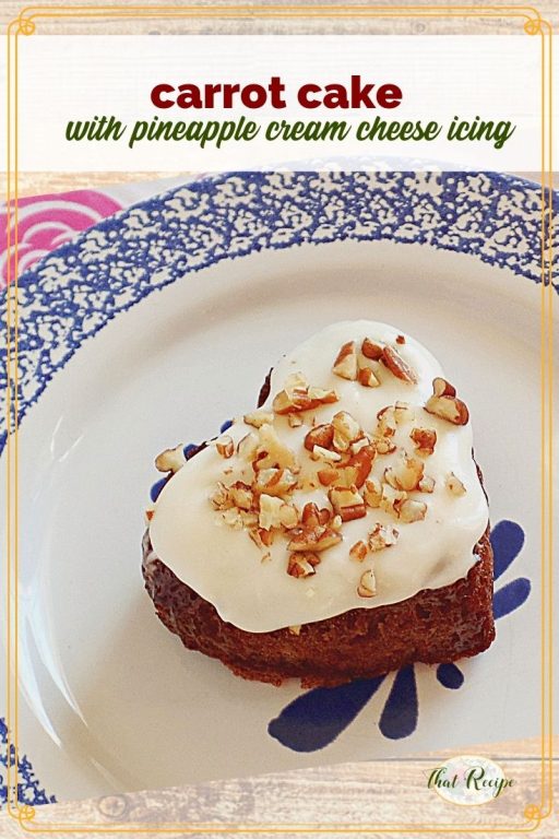 heart shaped carrot cake with text overlay "carrot cake with pineapple cream cheese icing"