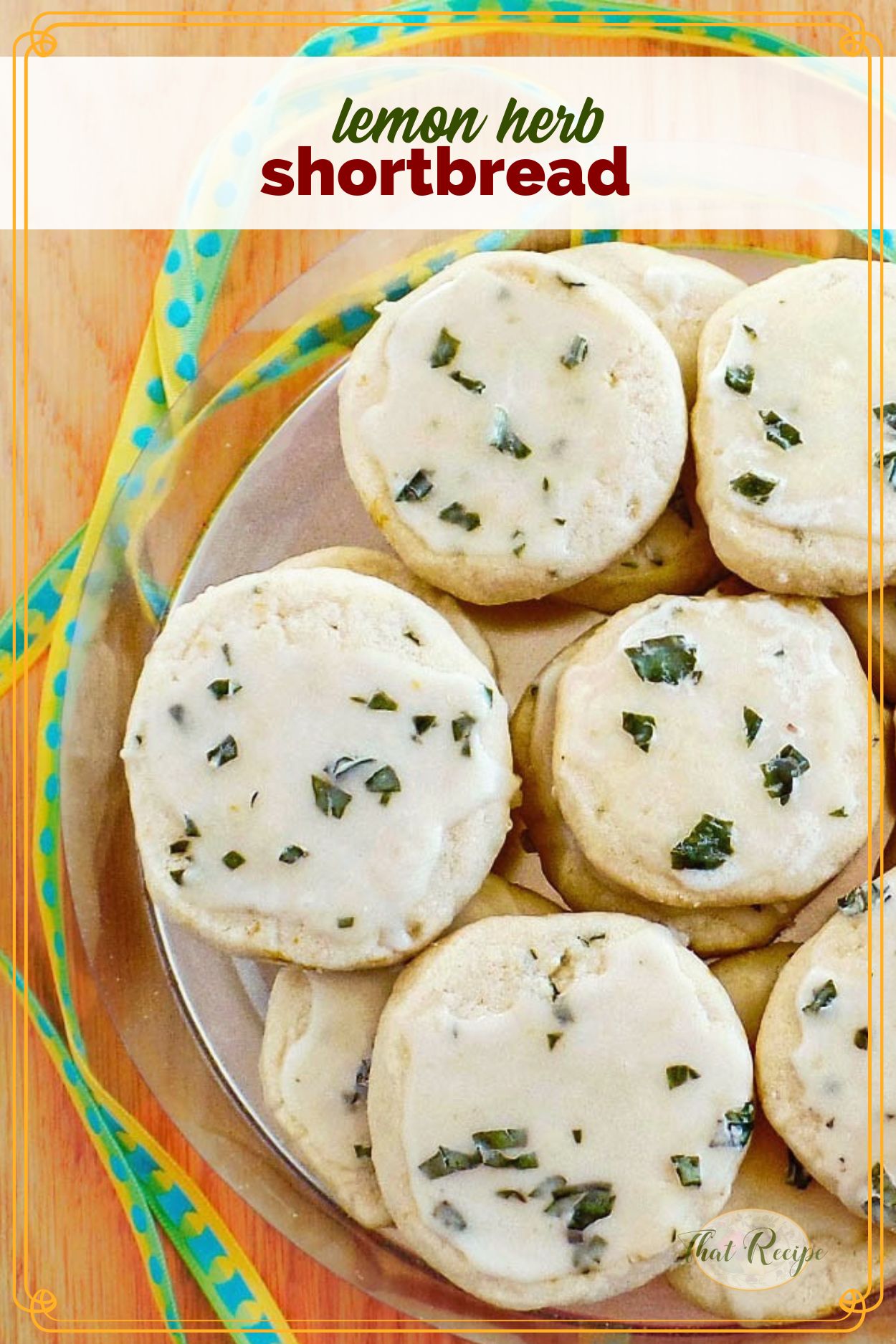 top down view of iced cookies in a container with text overlay lemon herb shortbread
