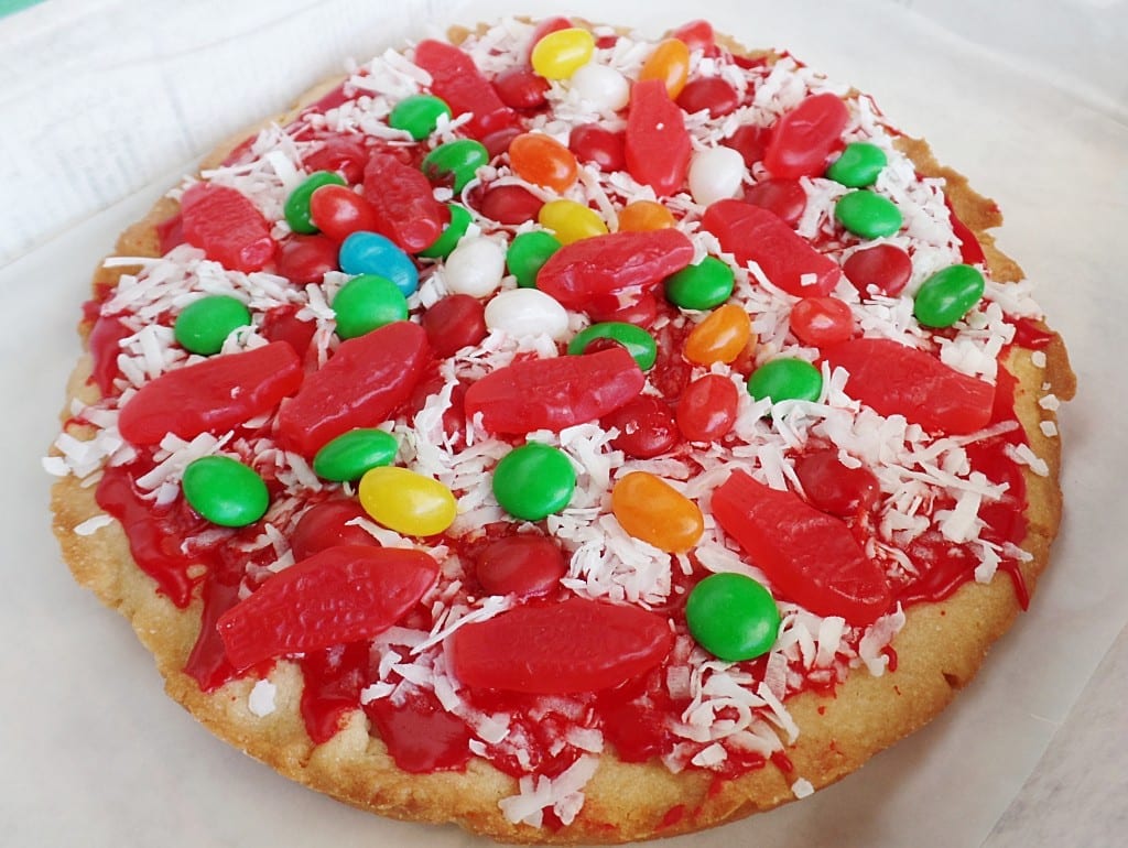 A giant sugar cookie decorated like a Pepperoni Jalapeno Jelly Bean Pizza with Anchovies the Ninja Turtles would love. April Fools Day dessert, faux foods.