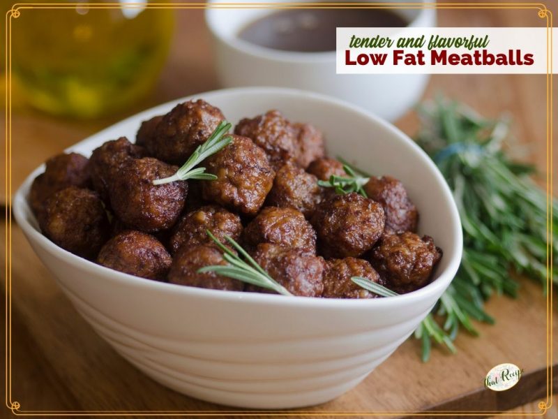 bowl of meatballs with rosemary garnish and text overlay "tender and flavorful low fat meatballs"