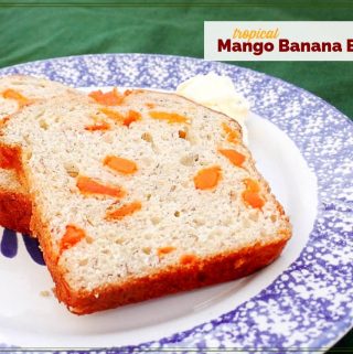 slices of banana bread on a plate with text overlay "tropical Mango Banana Bread"