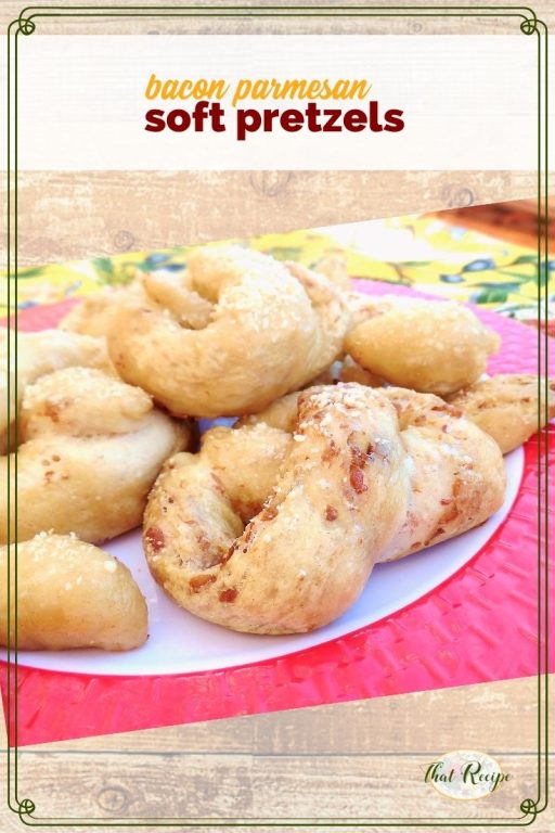 soft pretzels on a plate with text overlay "bacon sourdough soft pretzels"