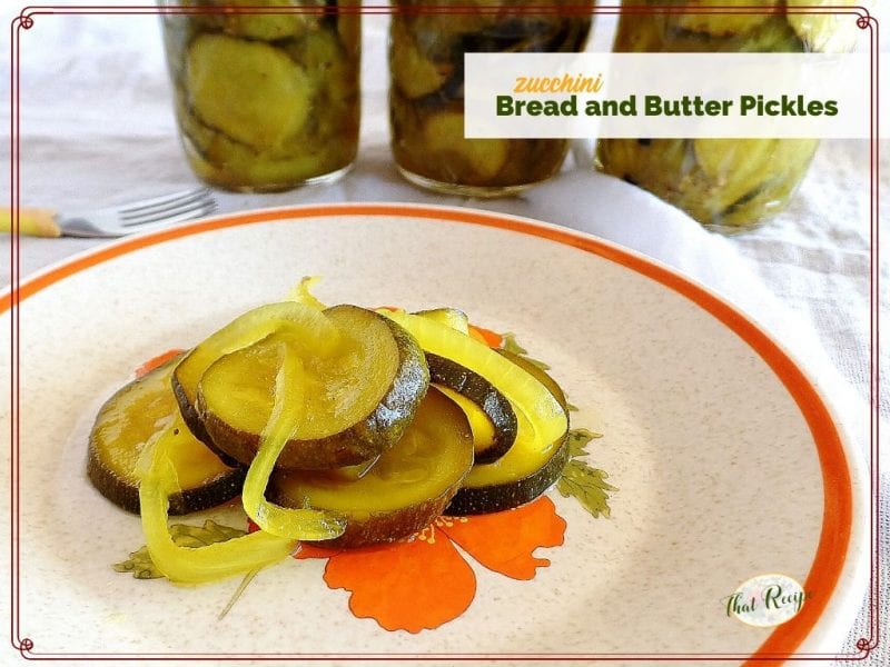 pickle slices on a plate with text overlay "zucchini bread and butter pickles"