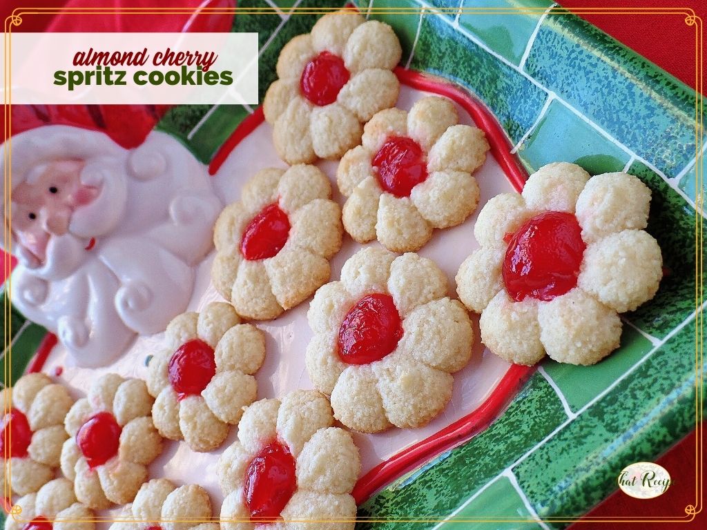 top down view of spritz cookies with text overlay gluten free cherry almond spritz cookies"