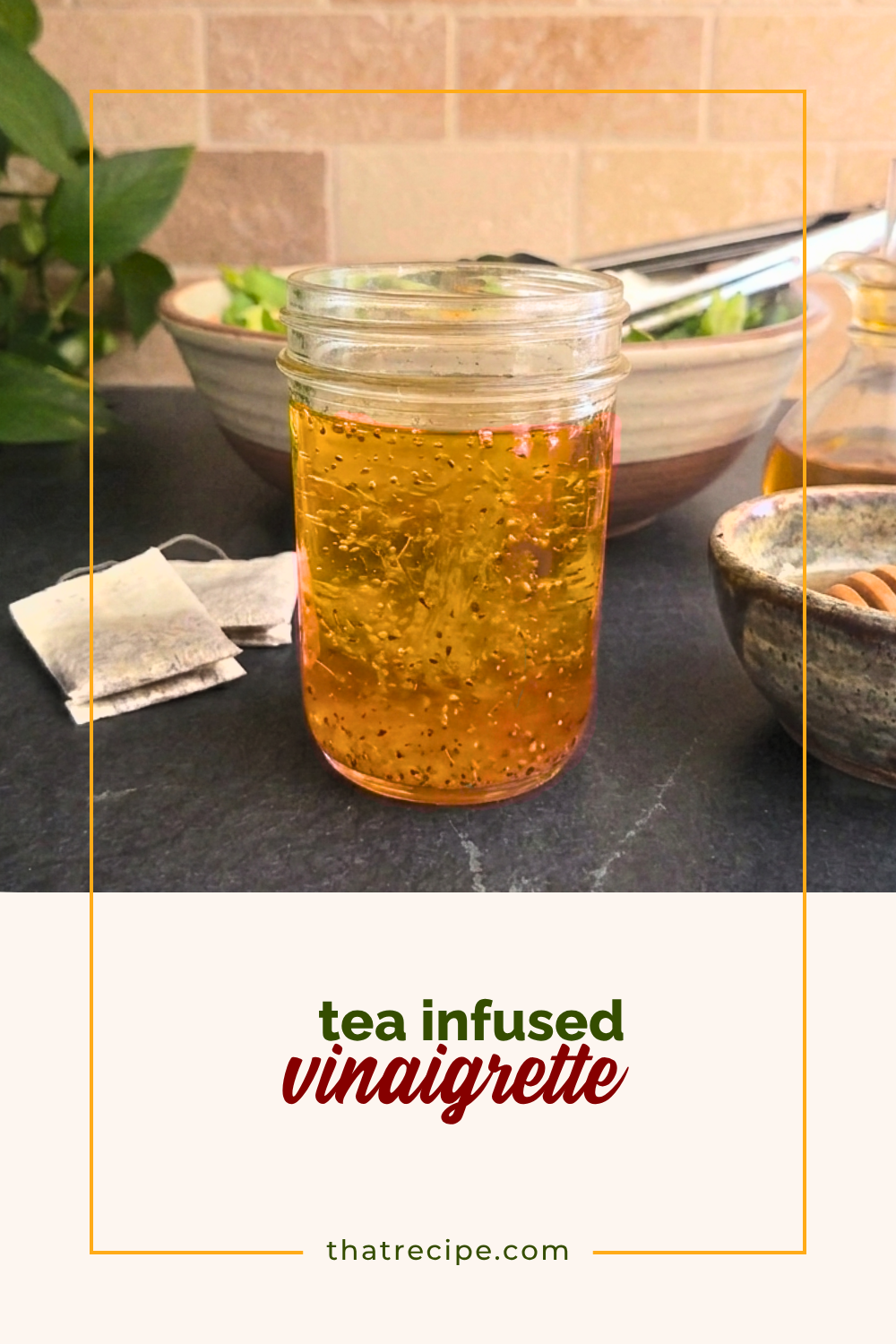 salad dressing on a counter with salad, tea bags and honey
