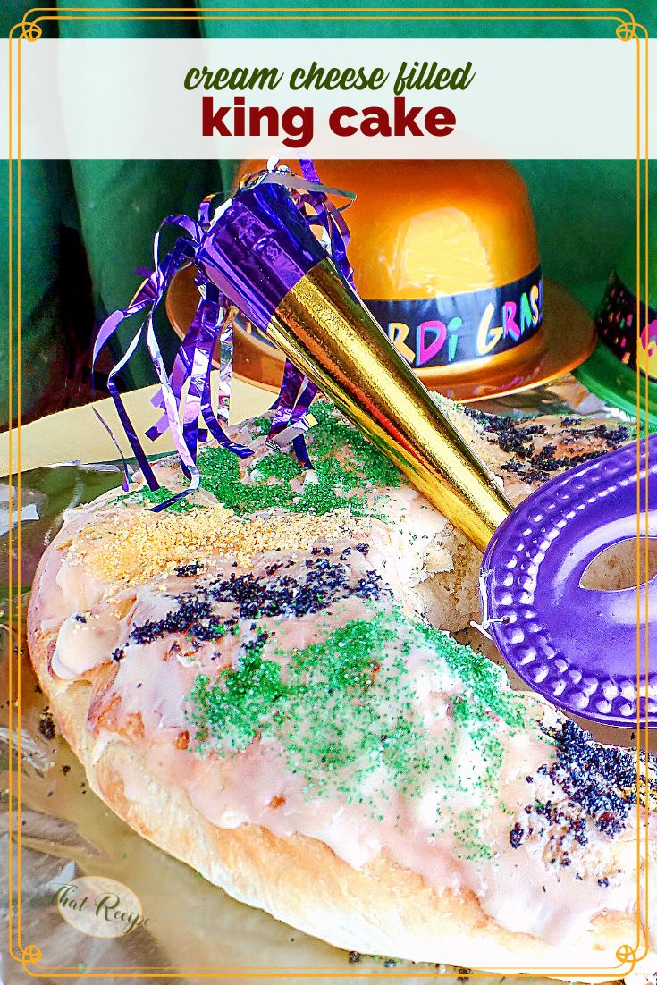 King Cake on a table with text overlay "Cream Cheese filled King Cake"