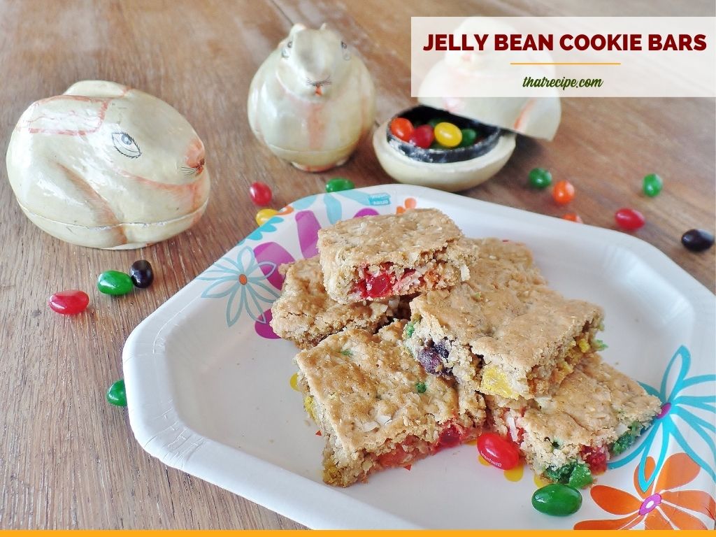 cookie bars on a plate with bunny shaped jelly bean holders and text overlay "coconut oatmeal jelly bean cookies"