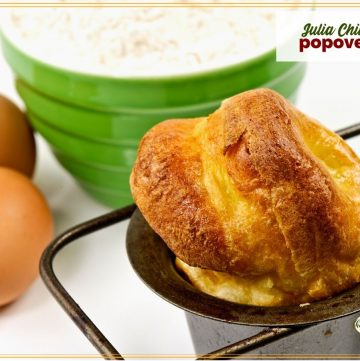 close up of popover in a pan with text overlay "Julia Child's Popovers"