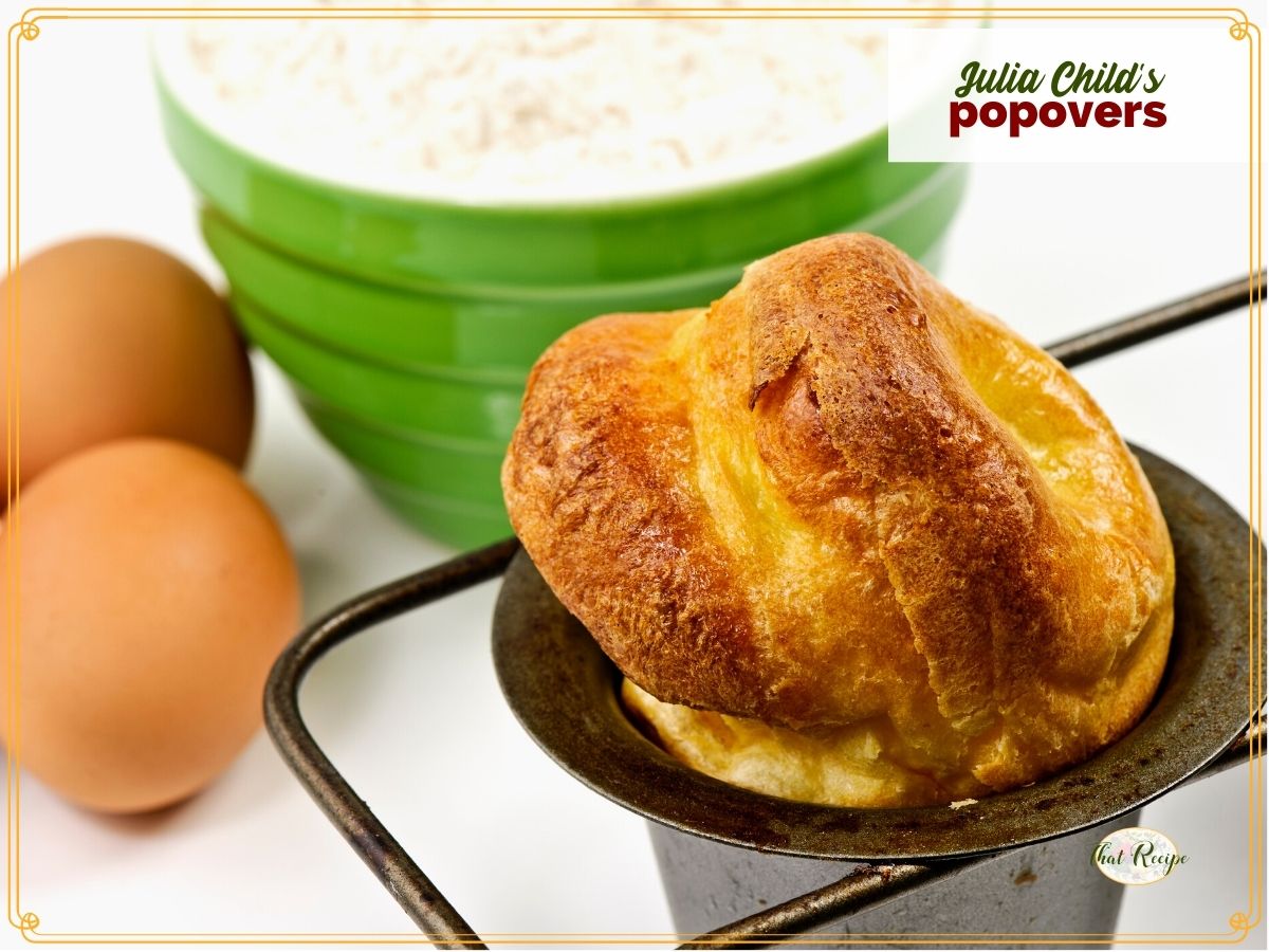 close up of popover in a pan with text overlay "Julia Child's Popovers"