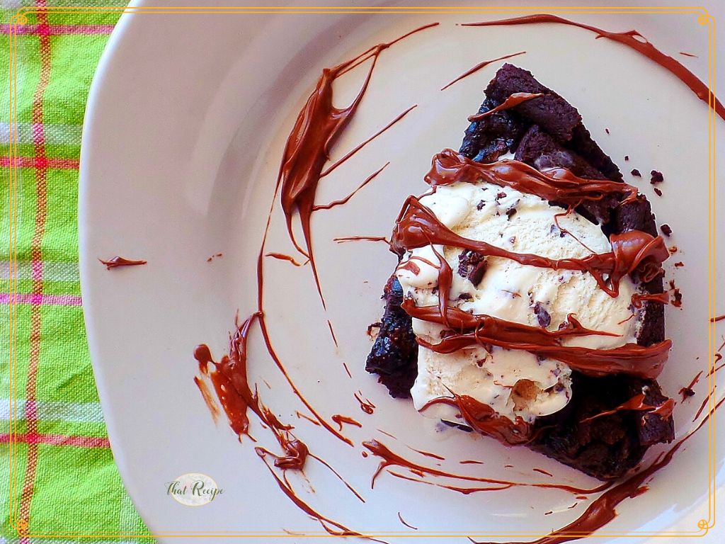 Black bean brownie topped with ice cream and nutella