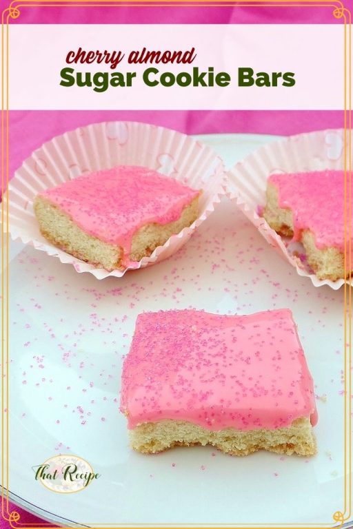 cookie bars on a plate with text overlay "cherry almond sugar cookie bars"