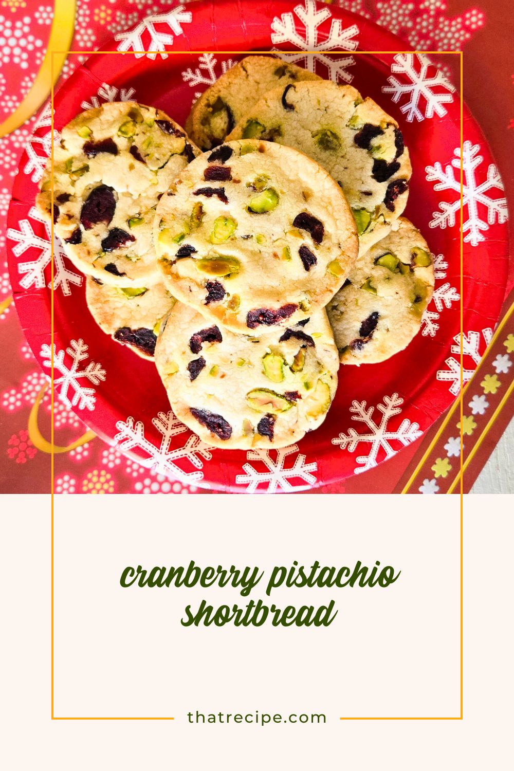 cranberry pistachio shortbread cookies on a plate