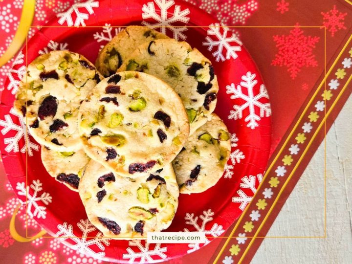 cranberry pistachio shortbread cookies on a plate