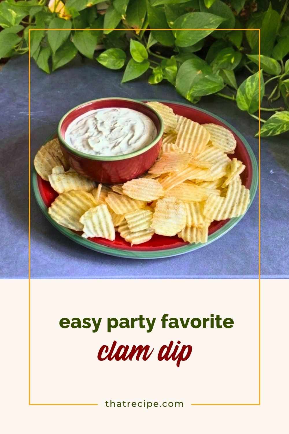 clam dip in a bowl with chips
