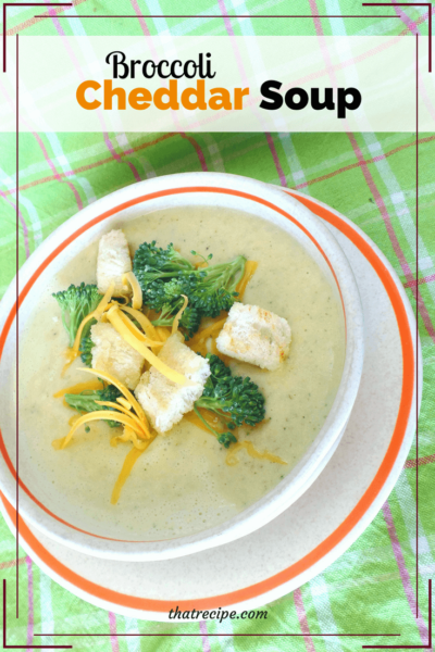 bowl of cheddar and broccoli soup with text overlay