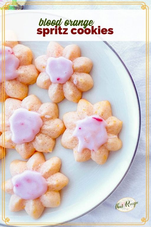 spritz cookies on a plate with text overlay "blood orange spritz cookies"