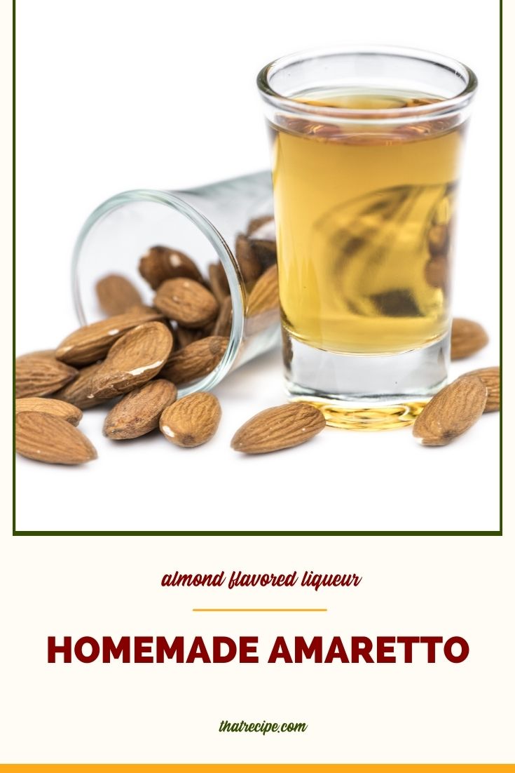 Amaretto in a cordial glass surrounded by almonds with text overlay "homemade Amaretto"