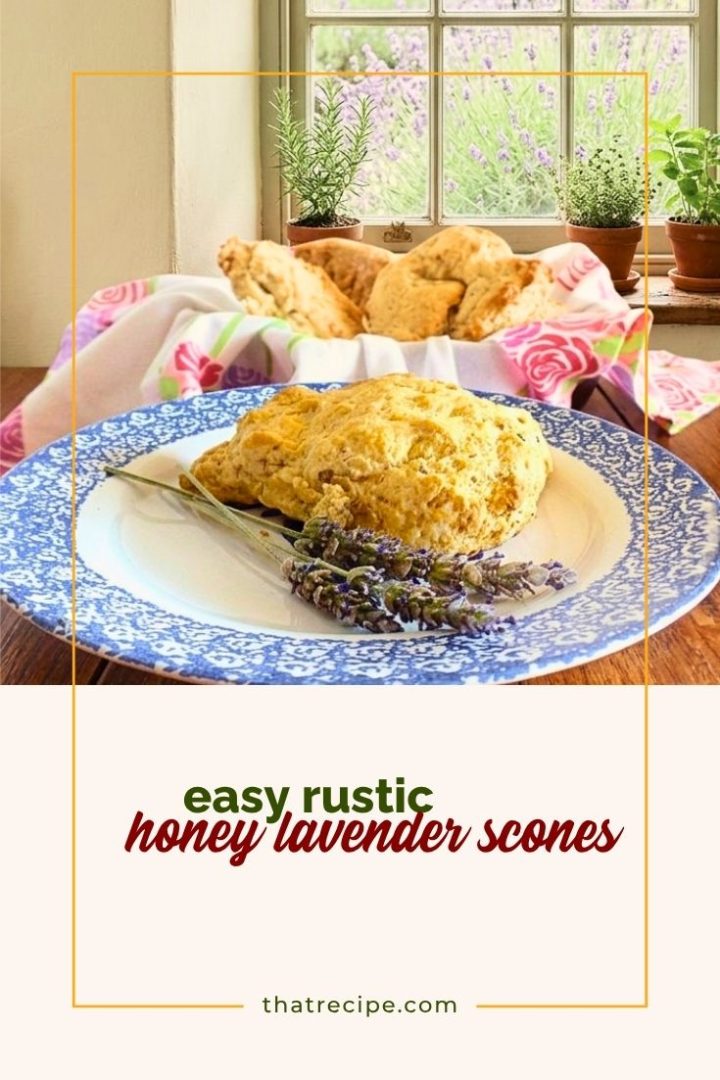 scone on a plate with fresh lavender blossoms