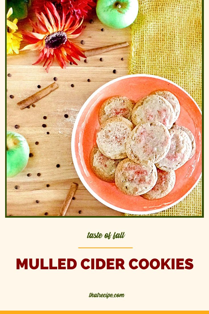 cookies on a plate surrounded by apples and spices with text overlay "mulled apple cider cookies"