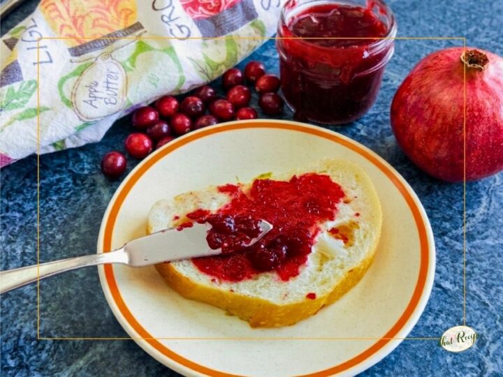 pomegranate cranberry jam on a slice of bread