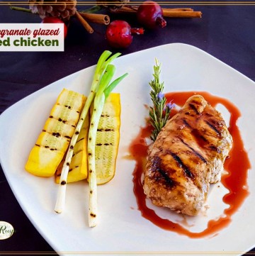 grilled chicken and vegetables on plate with text overlay pomegranate grilled chicken