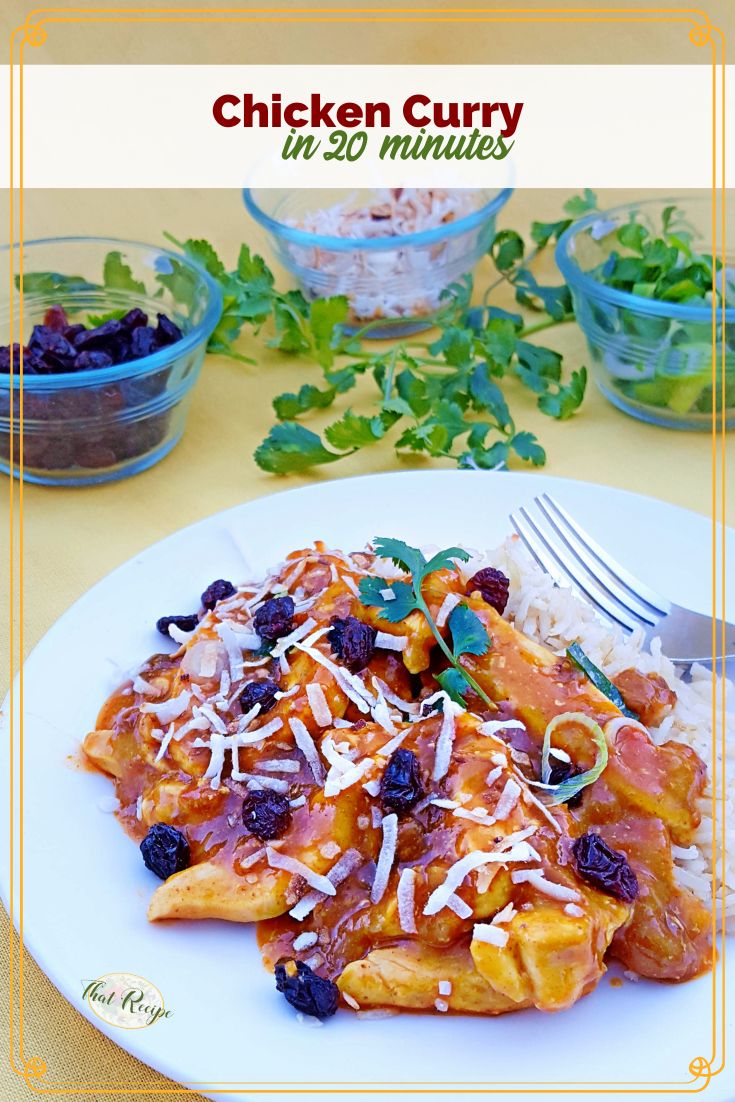 chicken curry on a plate with condiments