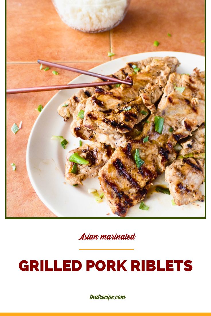 Grilled Asian style pork riblets on a plate with text overlay.