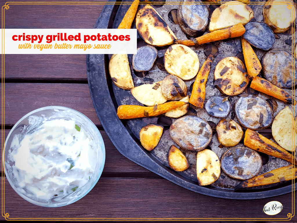grilled potatoes on a pan with vegan butter mayo sauce