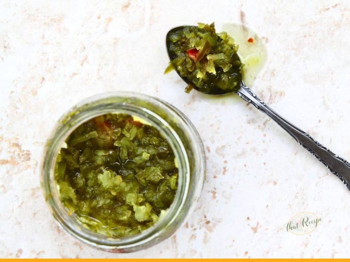 top down view of pickle relish in a glass jar and on a spoon