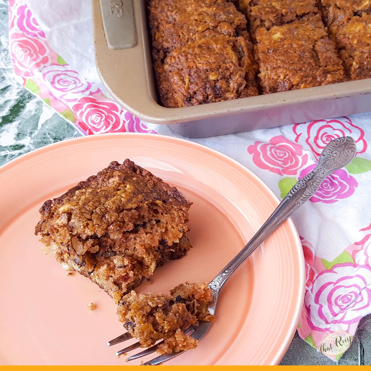 slice of apple walnut snack cake on a plate