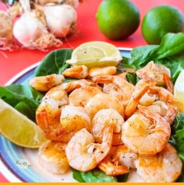 stir fried butter and garlic shrimp with limes and raw garlic