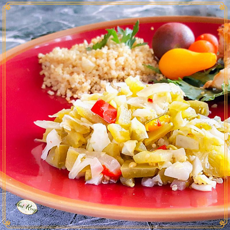 green tomato relish on a plate with text overlay "green tomato chow chow"