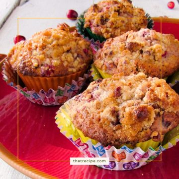 plate of cranberry pecan muffins