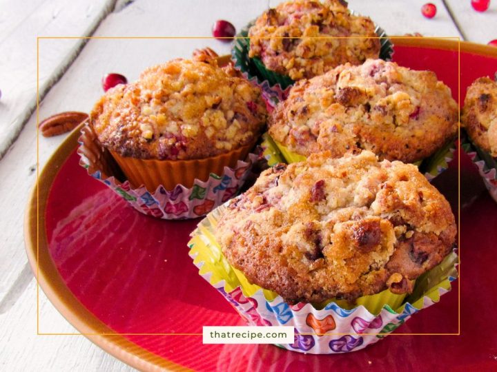 plate of cranberry pecan muffins