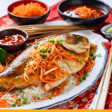 whole fish on a plate with text overlay "Pan Fried Sweet and Sour Fish"