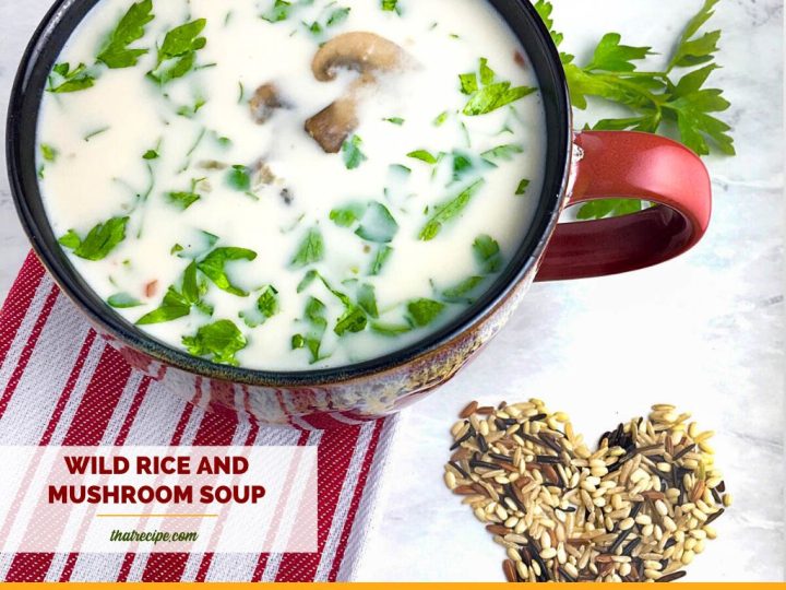 mushroom soup in a mug with text overlay "wild rice and mushroom soup"