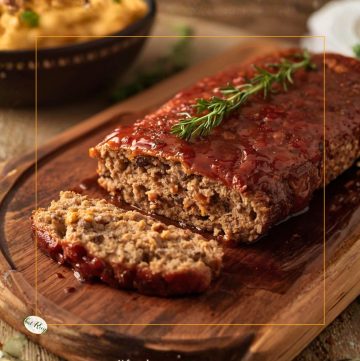 glazed meatloaf on a cutting board