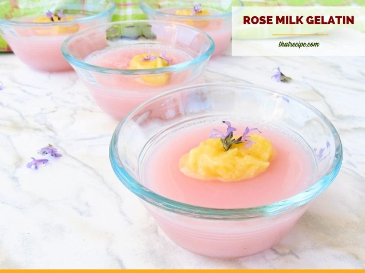pink gelatin topped with lemon curd and purple flower