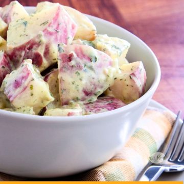 bowl of red potato salad on a table