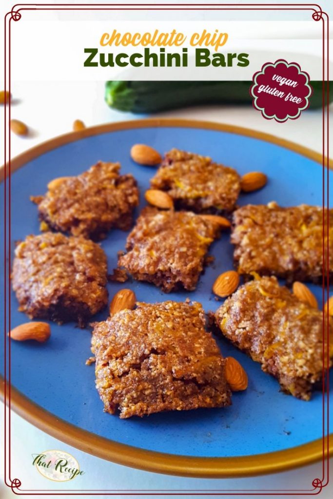 zucchini bars on a plate with almonds and text overlay "chocolate chip zucchini bars"