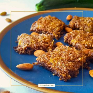 zucchini bars on a plate with almonds