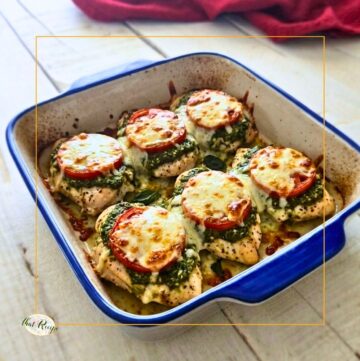 tomato pesto chicken in a casserole dish