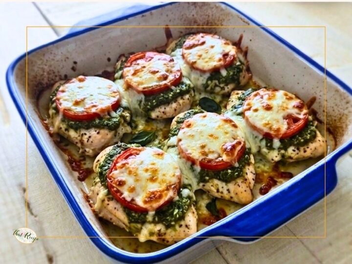 tomato pesto chicken in a casserole dish