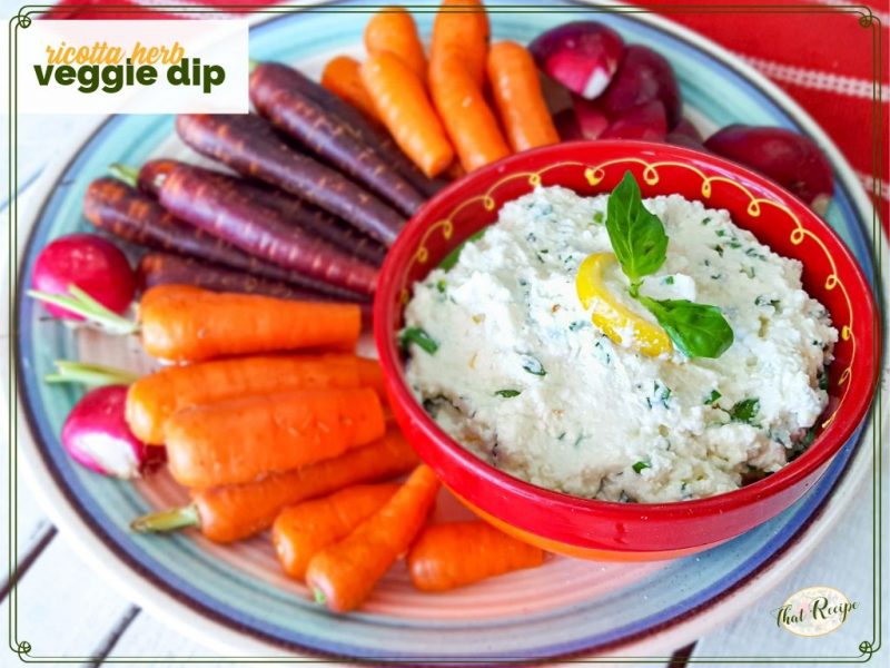 vegetables on a plate with ricotta dip and text overlay "ricotta herb veggie dip"