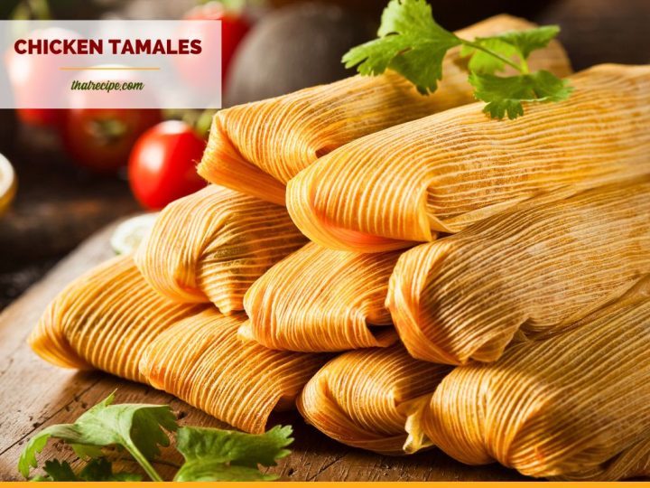 stacked chicken tamales on a board